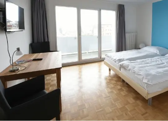 Auf Klassenfahrt mit HEROLÉ: Nyon Hostel - Doppelzimmer mit Flachbildfernseher in Genf