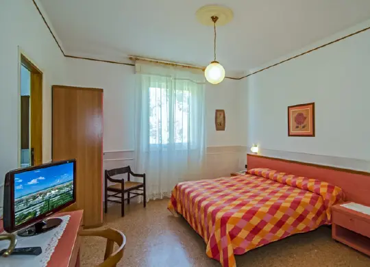 Auf Klassenfahrt mit HEROLÉ: Zimmer Hotel Ambra in der Toskana.